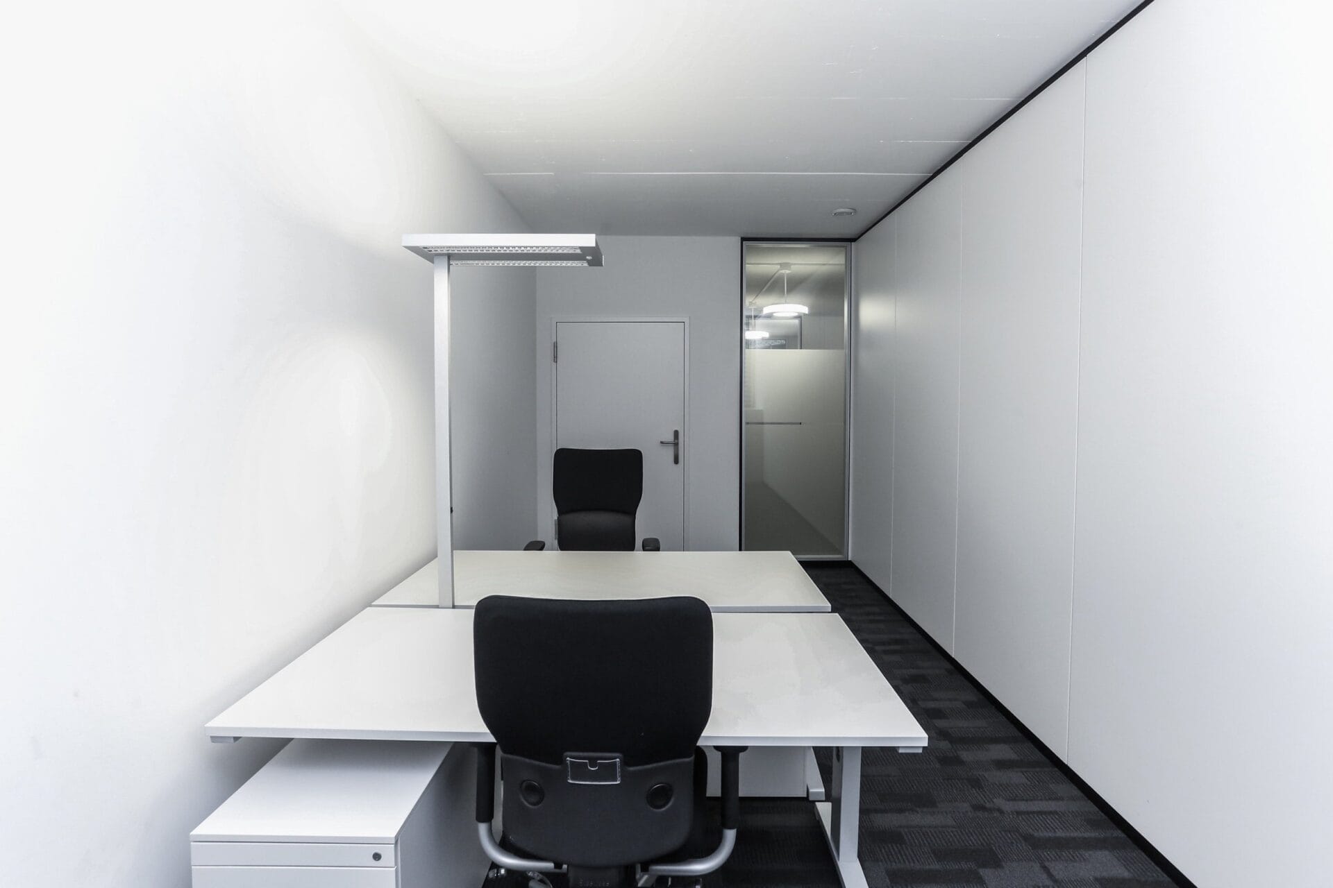 Small team office Office with two tables for team