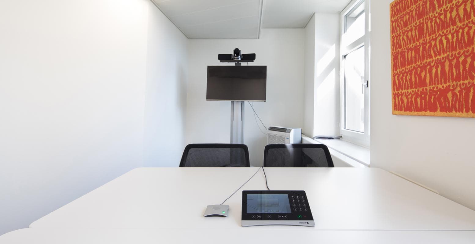 Meeting room for telephone conference with hands-free system