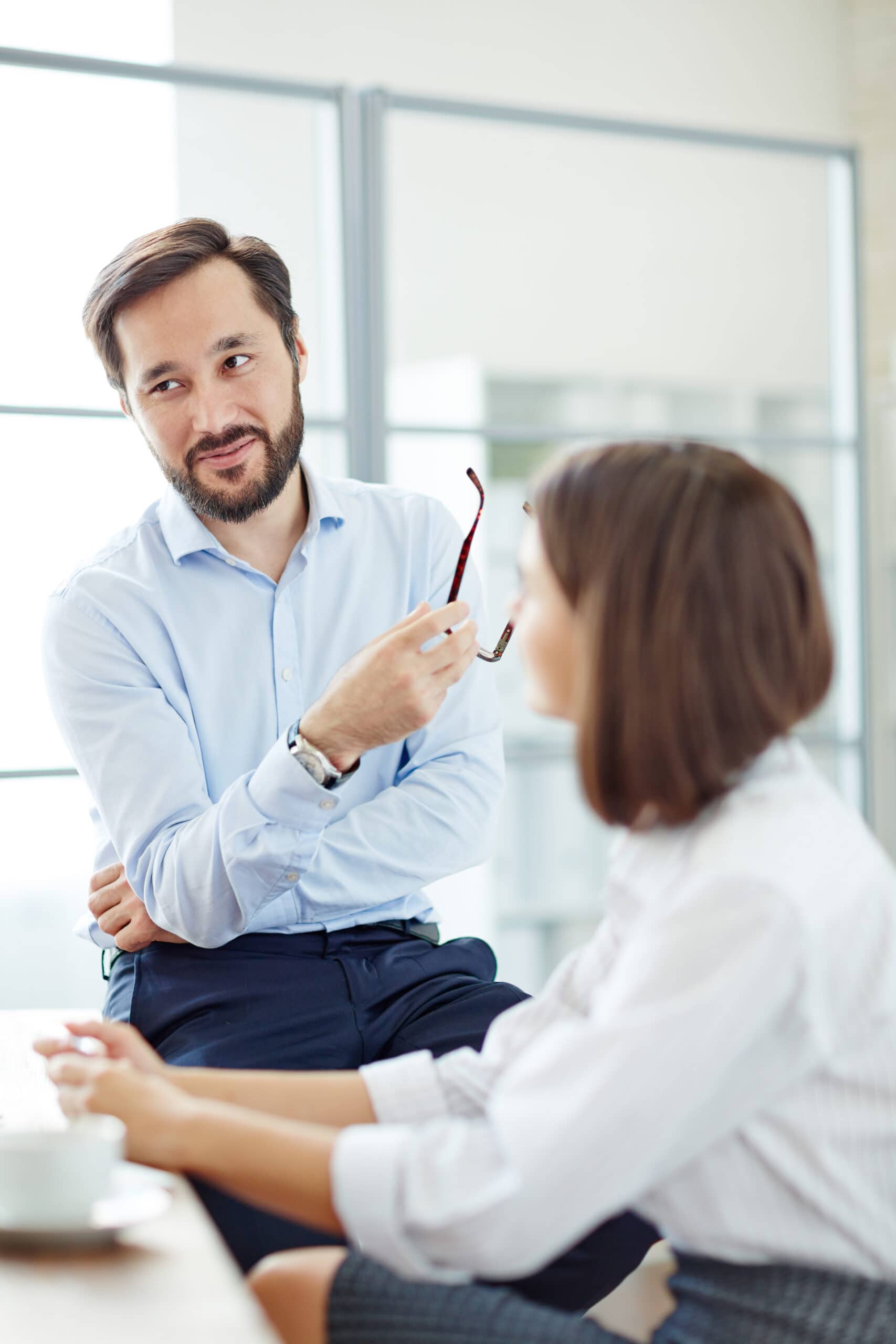 Man and woman on a coffee break in the office