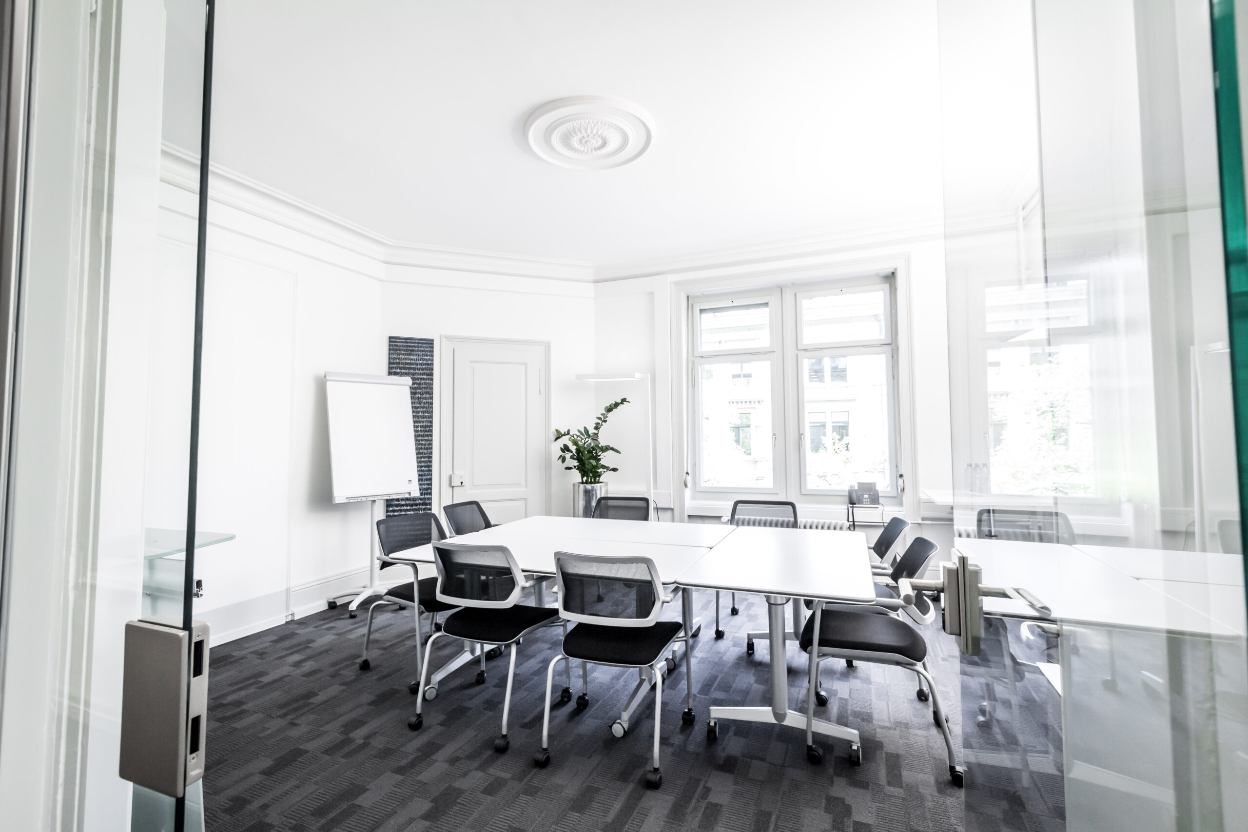 Bright meeting room with high ceilings
